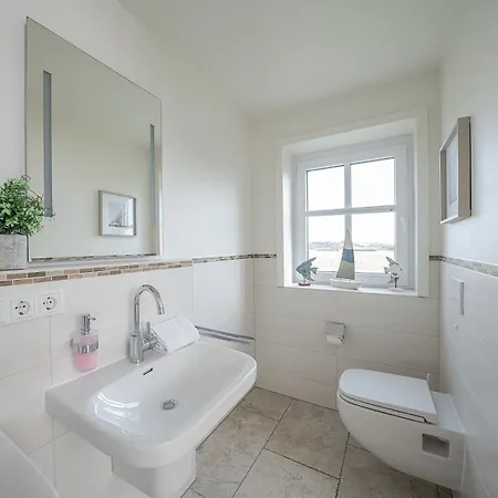 Reetdachidylle Am Deich - Charmante Doppelhaushaelften بيت للعطل Dagebüll